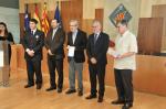 Personas distinguidas en Salou durante el Día de la Policía